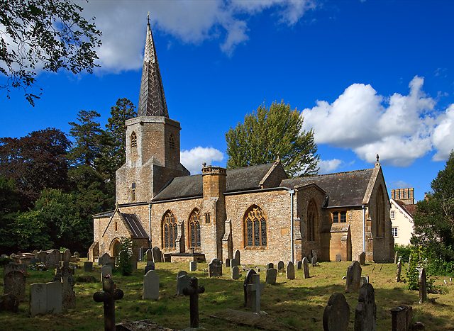 The church from the south-east, with the chancel, the south aisle and porch, and the tower and spire behind